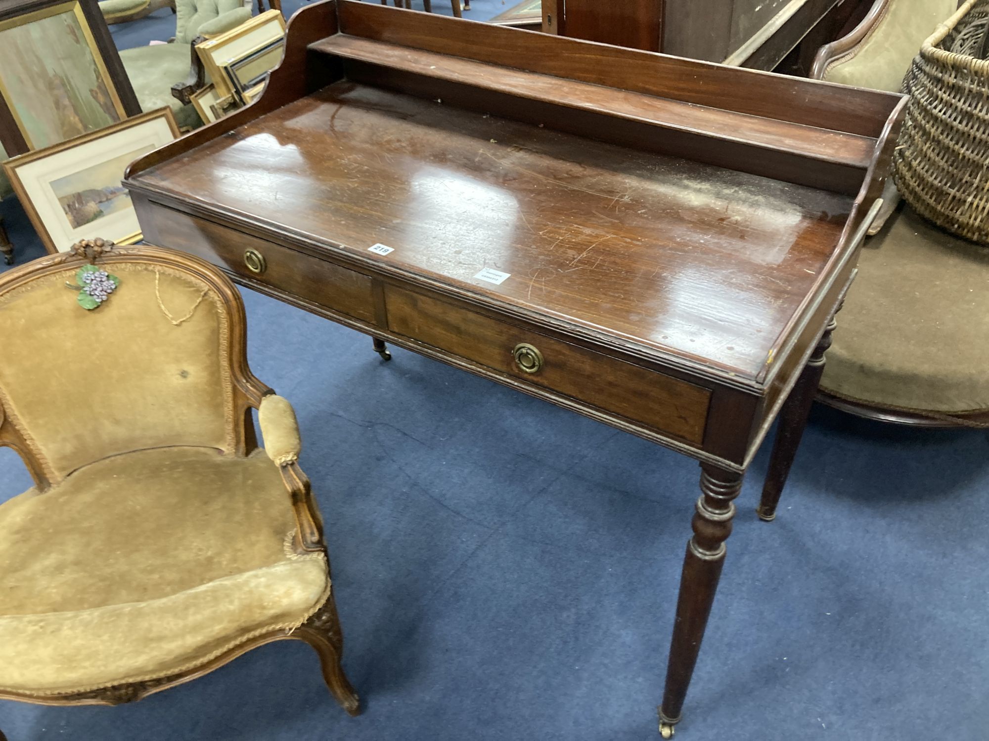 A late 17th century style oak oval topped, double gate leg dining table, width 214cm depth 180cm (extended) height 75cm